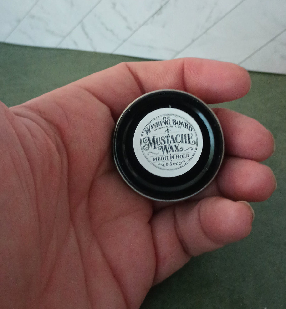 Unscented medium hold mustache wax from The Washing Board.