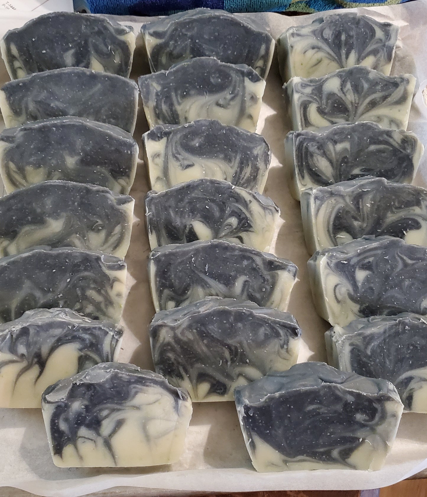 Cucumber Charcoal Dream shown on a washing board.