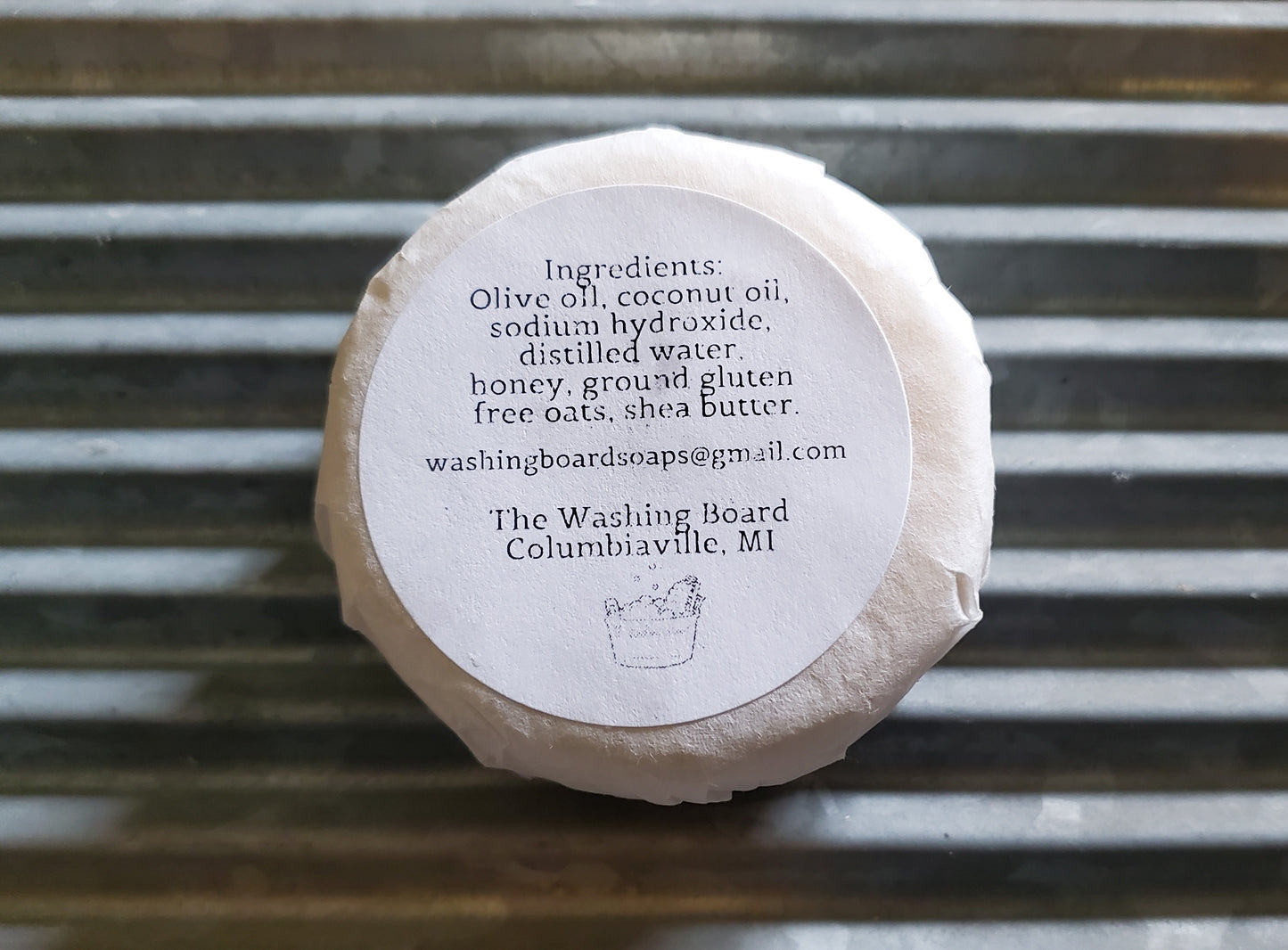 Bee Happy shown with ingredient label and eco friendly packaging.