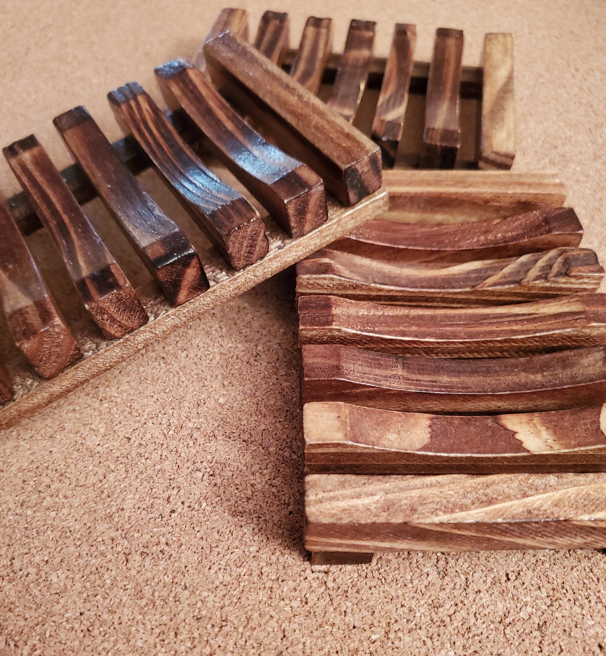 3 Dark color wooden soap dishes together