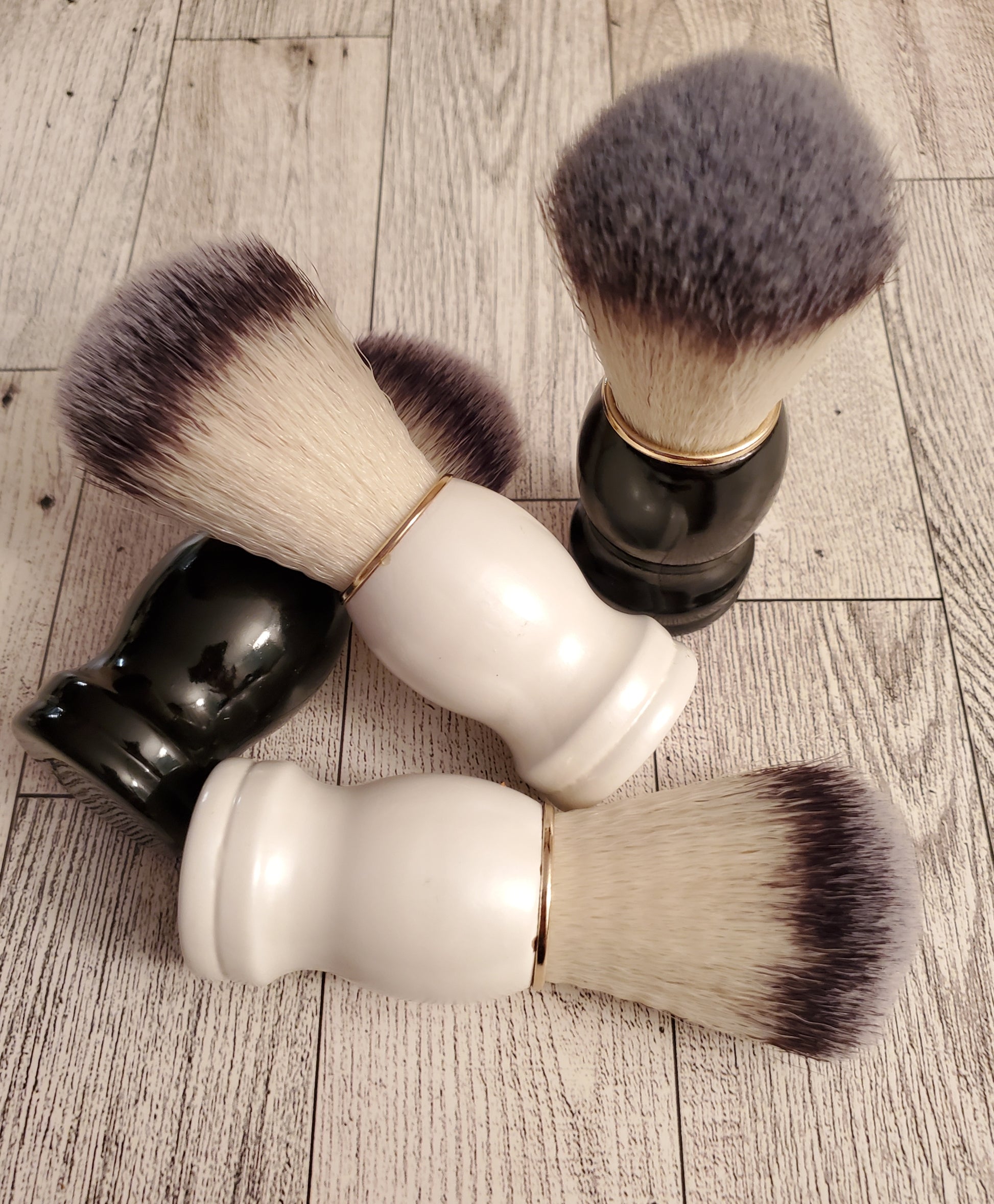 Shave Brush,  black and white handle together.