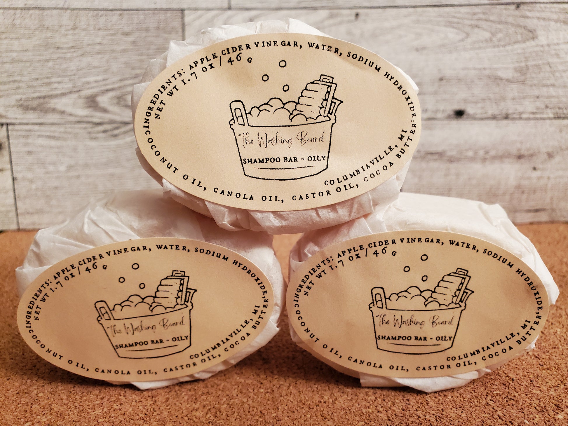 Shampoo bars,  oily,  shown in eco friendly packaging.