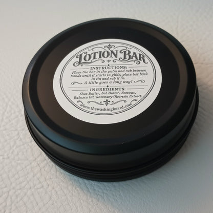 Unscented solid lotion bar in a tin from The Washing Board.