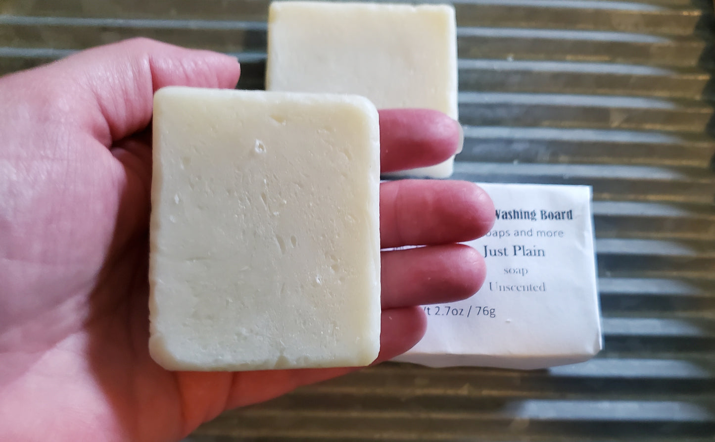 Just Plain Soap bar shown in a woman's hand. 