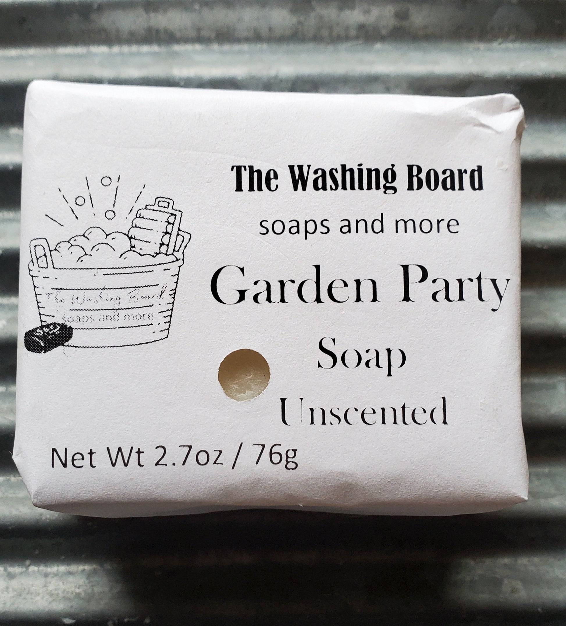 Garden Party bar shown in eco friendly packaging on a washboard. 