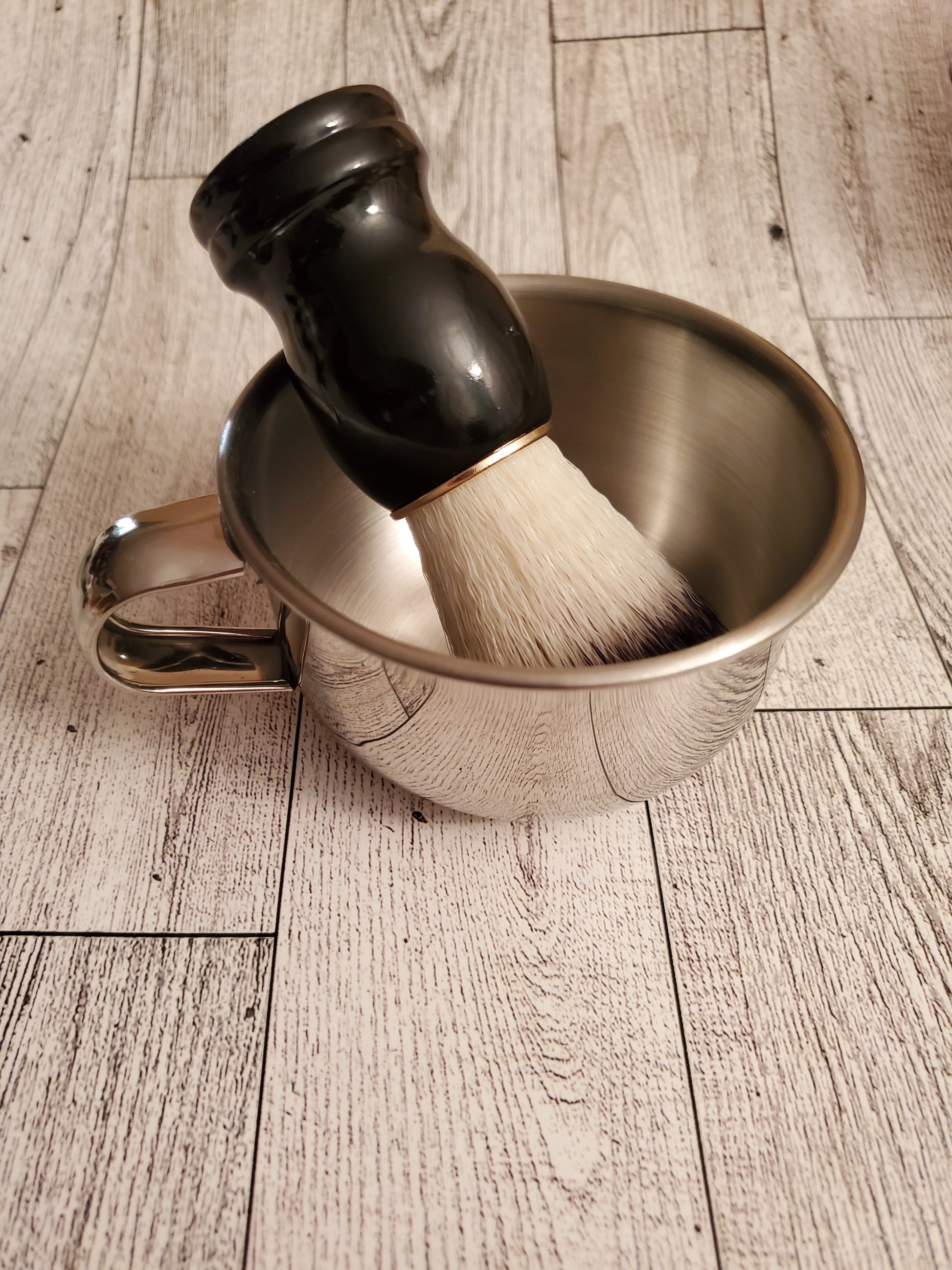 Shave Bowl, stainless steel, shown with Shave Brush black handle. 