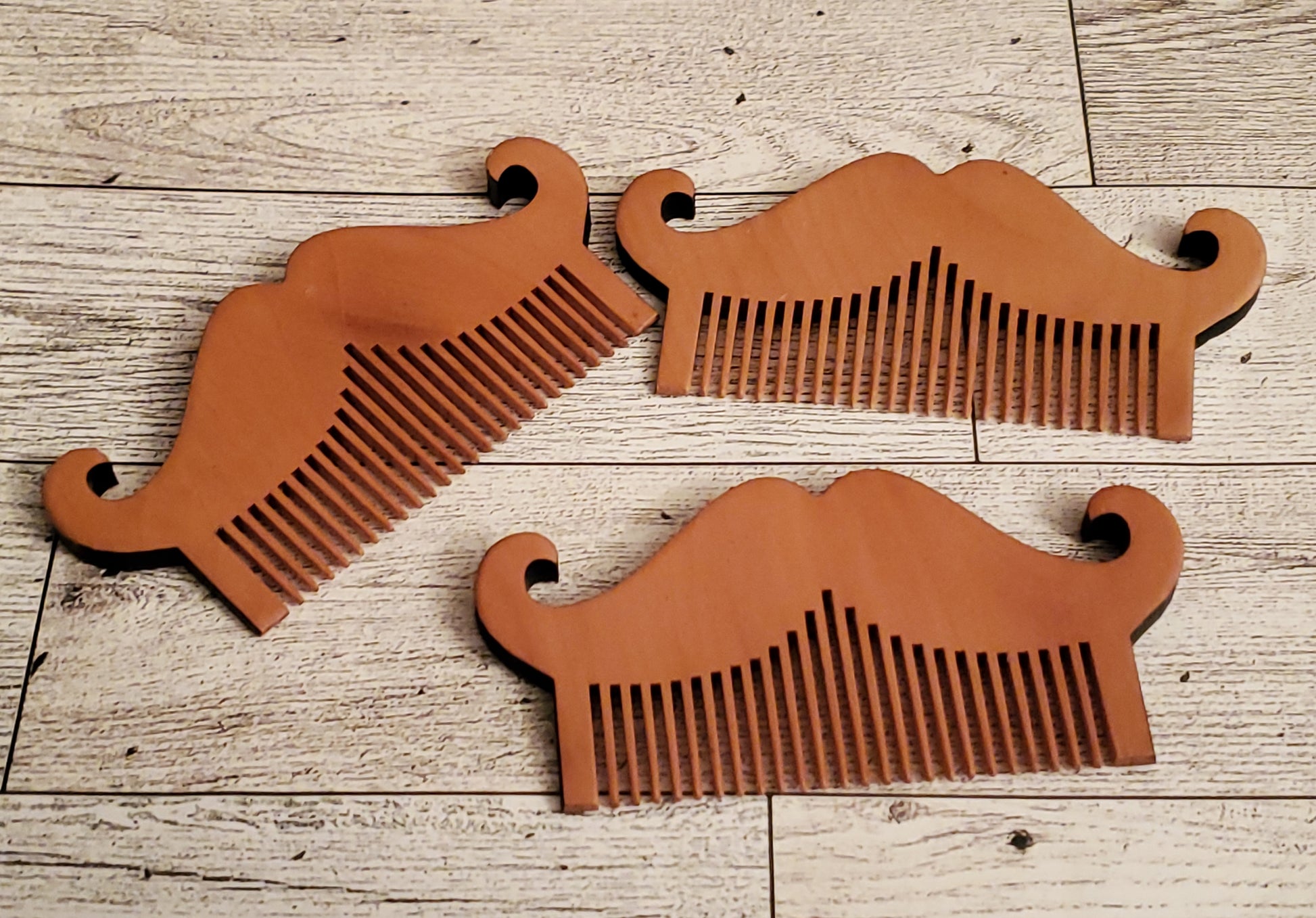 3 Mustache Combs shown together